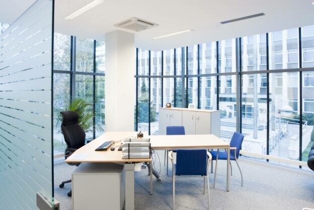 Office furniture in a bright lit office space