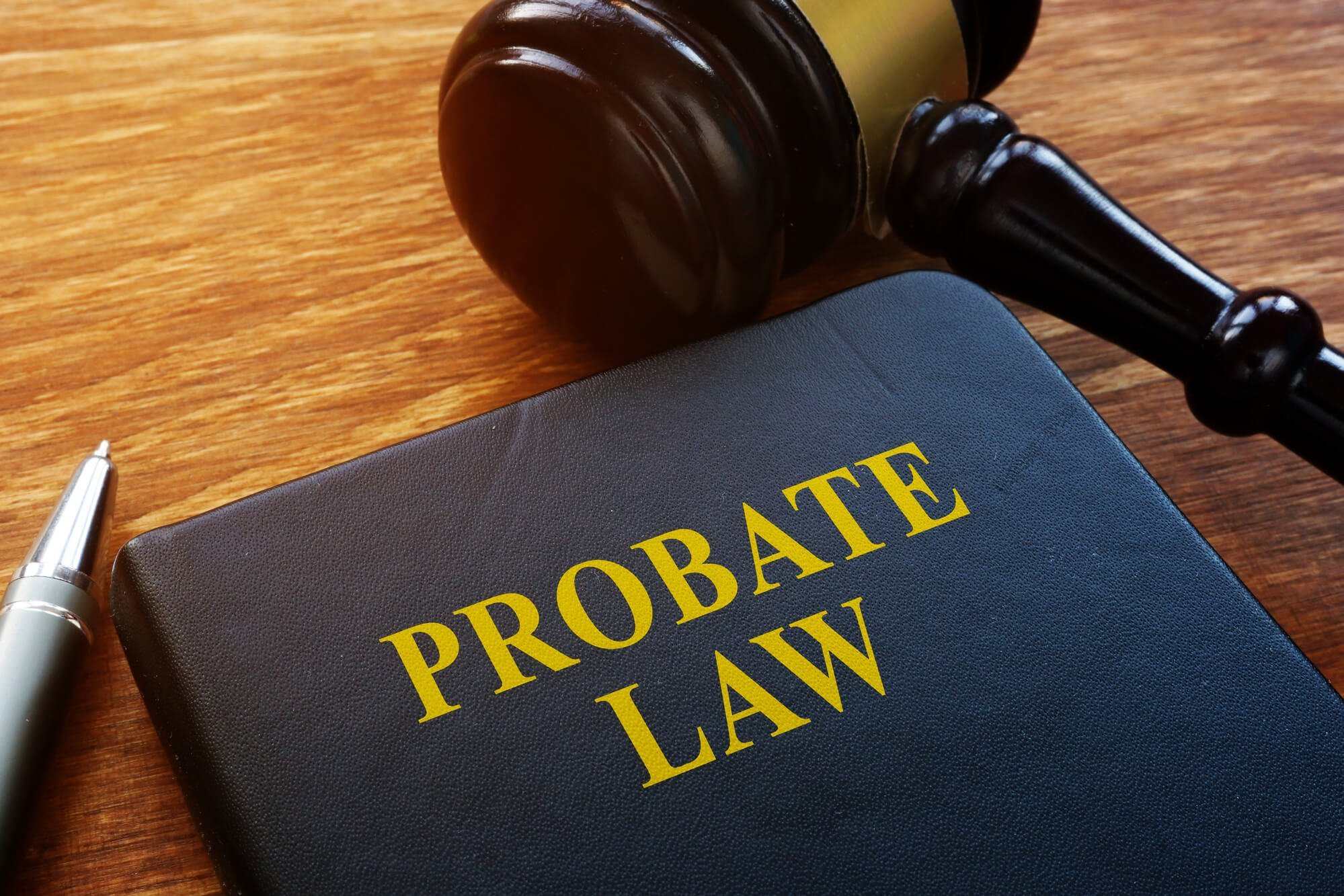 Probate law book with a  gavel by its side